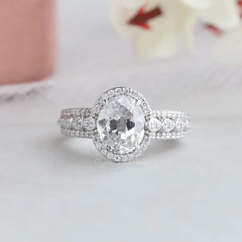 Oval old mine cut lab diamond pave set engagement and wedding ring set in white gold looking more precious as the love gift.