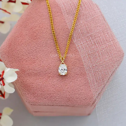 Old mine diamond solitaire yellow gold pendant made with the 16-inch chain and basket setting formation.