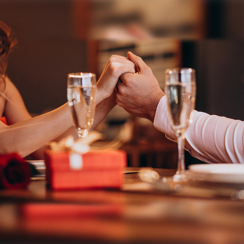 Woman proposed by man on the romantic dinner night