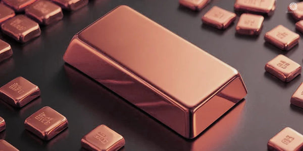 [A rose gold bar surrounded by smaller rose gold ingots, symbolizing elegance and luxury.]-[ouros jewels]