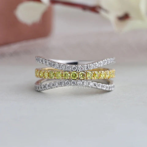 Channel set ring in yellow and white color round diamond