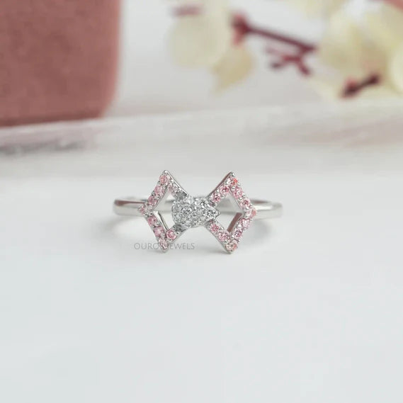 [Click to View Our round-cut bow-shaped diamond ring crafted with lab-grown diamonds. Get ready to dazzle with this classic wear with Pink Diamonds. Shop now!]-[ouros jewels]