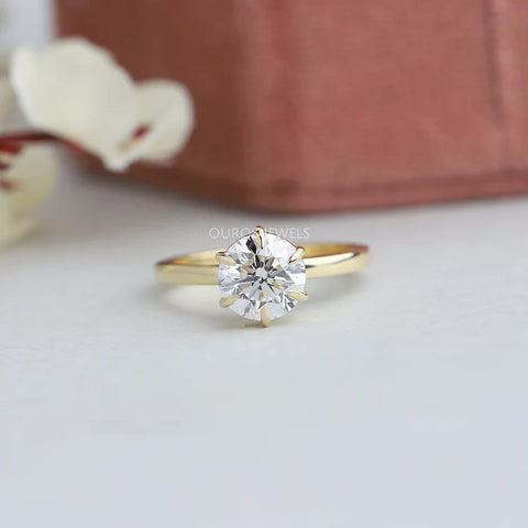 14KT yellow gold round diamond solitaire ring