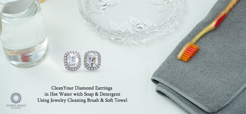 [Step-1 Sparkling diamond earrings laid out for cleaning with a soft brush and towel, ready for care with soap and hot water]-[ouros  jewels]