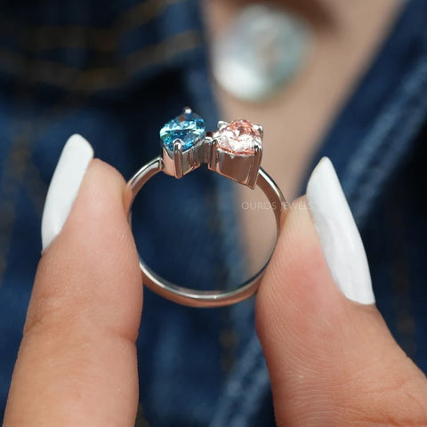 Blue marquise and pink colored lab-grown diamond Toi et Moi promise ring in VS clarity grade and white gold to appear a love sign and commitment towards a love partner.