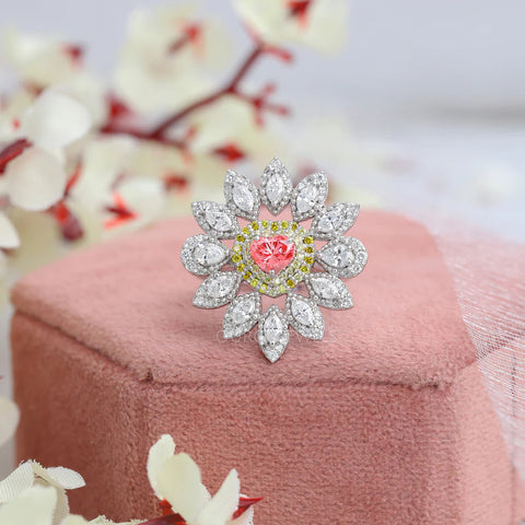 0.50 carat weighted pink colored lab-grown diamond vintage ring with colorless pear-shaped diamond in 14KT white gold.