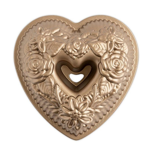 https://cdn.shopify.com/s/files/1/0527/7758/2760/products/NordicWare_Floral_Heart_Bundt_-_6_Cup_512x512.jpg?v=1676997087