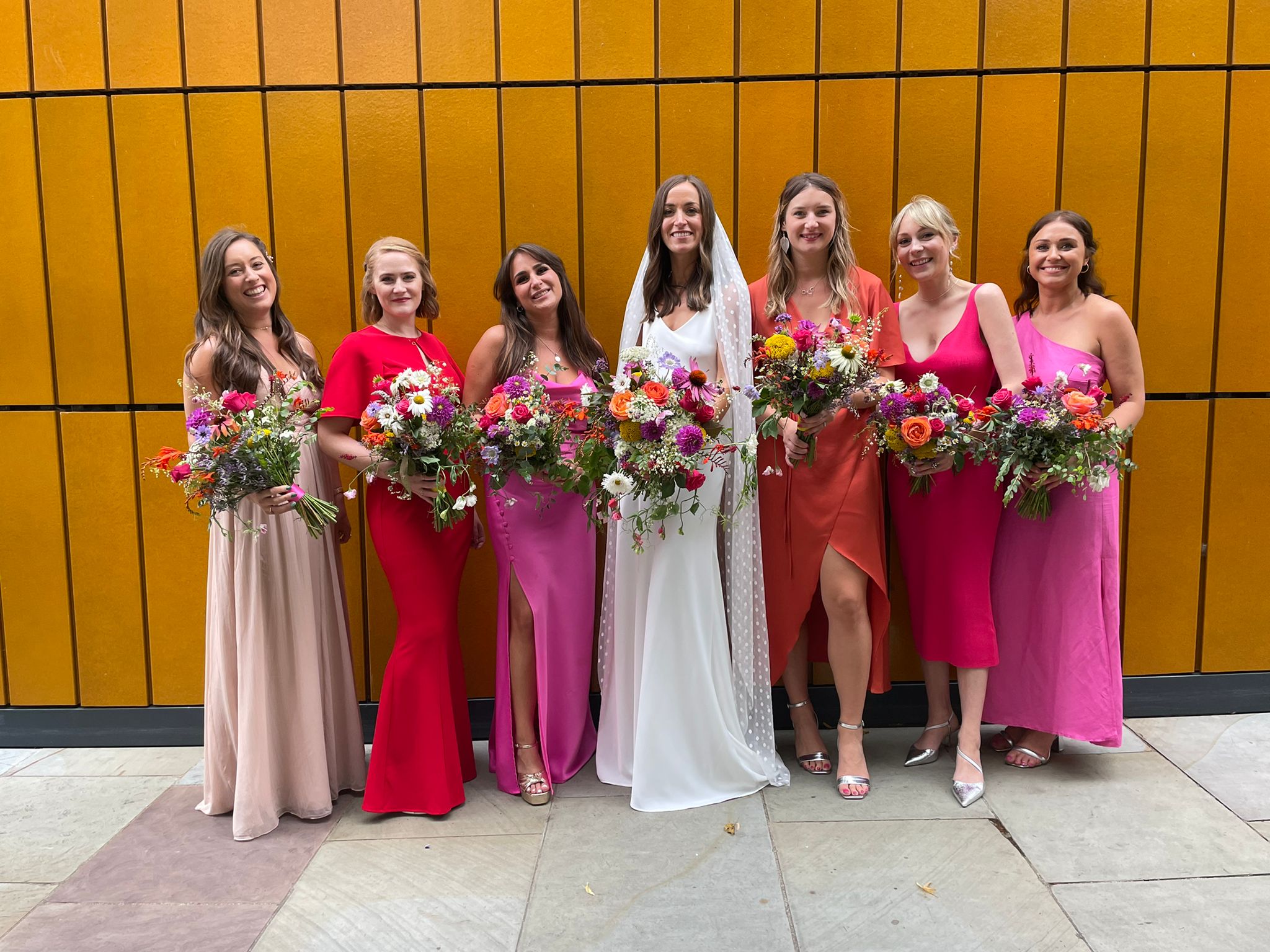 Pink bridesmaids dresses and sustainable wedding dress