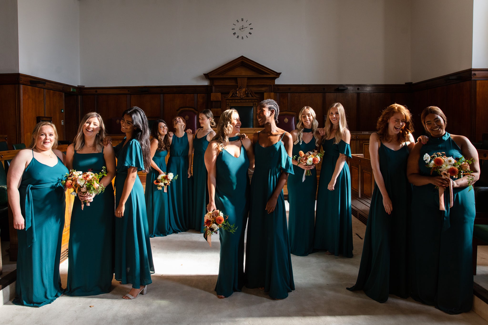 Dark green bridesmaids dresses with different body shapes and sizes, in the Town Hall hotel.