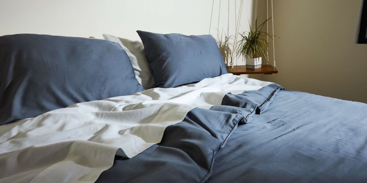 Slumber Cloud Best Bedding for Night Sweats - Made bed with sheets and duvet cover