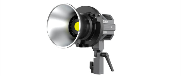 COLBOR CL60R comes with a Bowens mount adapter, a reflector, and a light base.