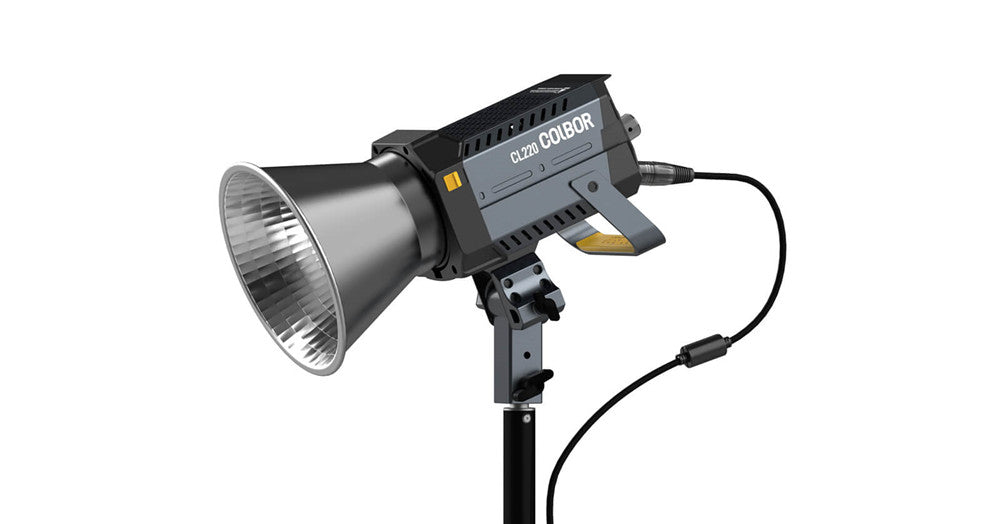 COLBOR CL220 LED light for outdoor photography is mounted on the stand.