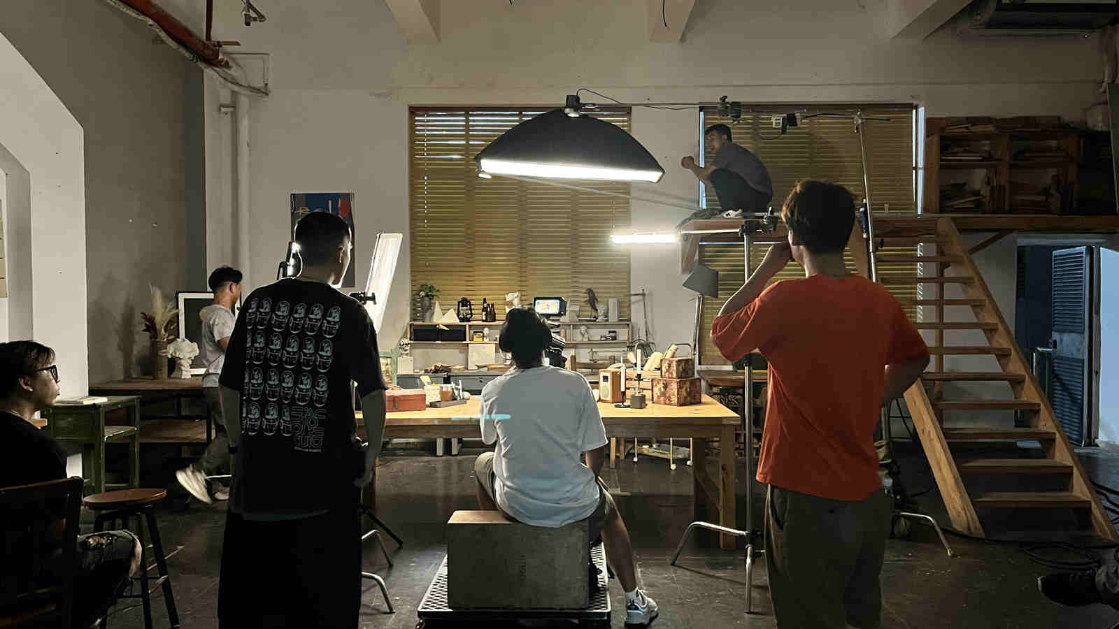 Several lights are used for lighting a video studio at home.