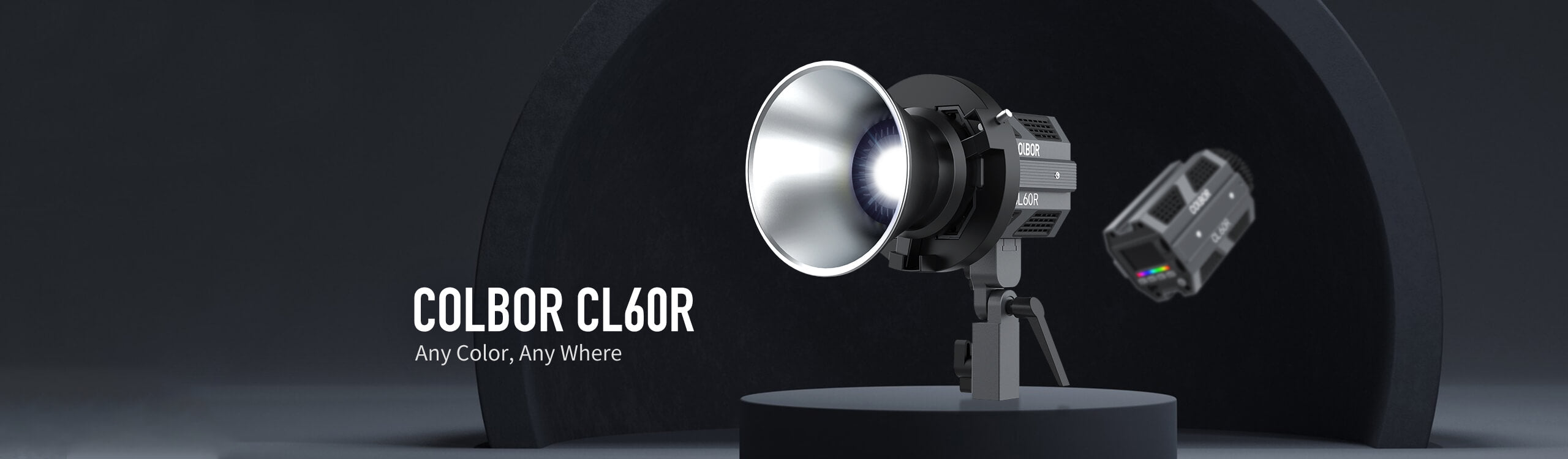 COLBOR CL60R RGB LED light comes with a Bowen-mount adapter, a reflector, and a light base.