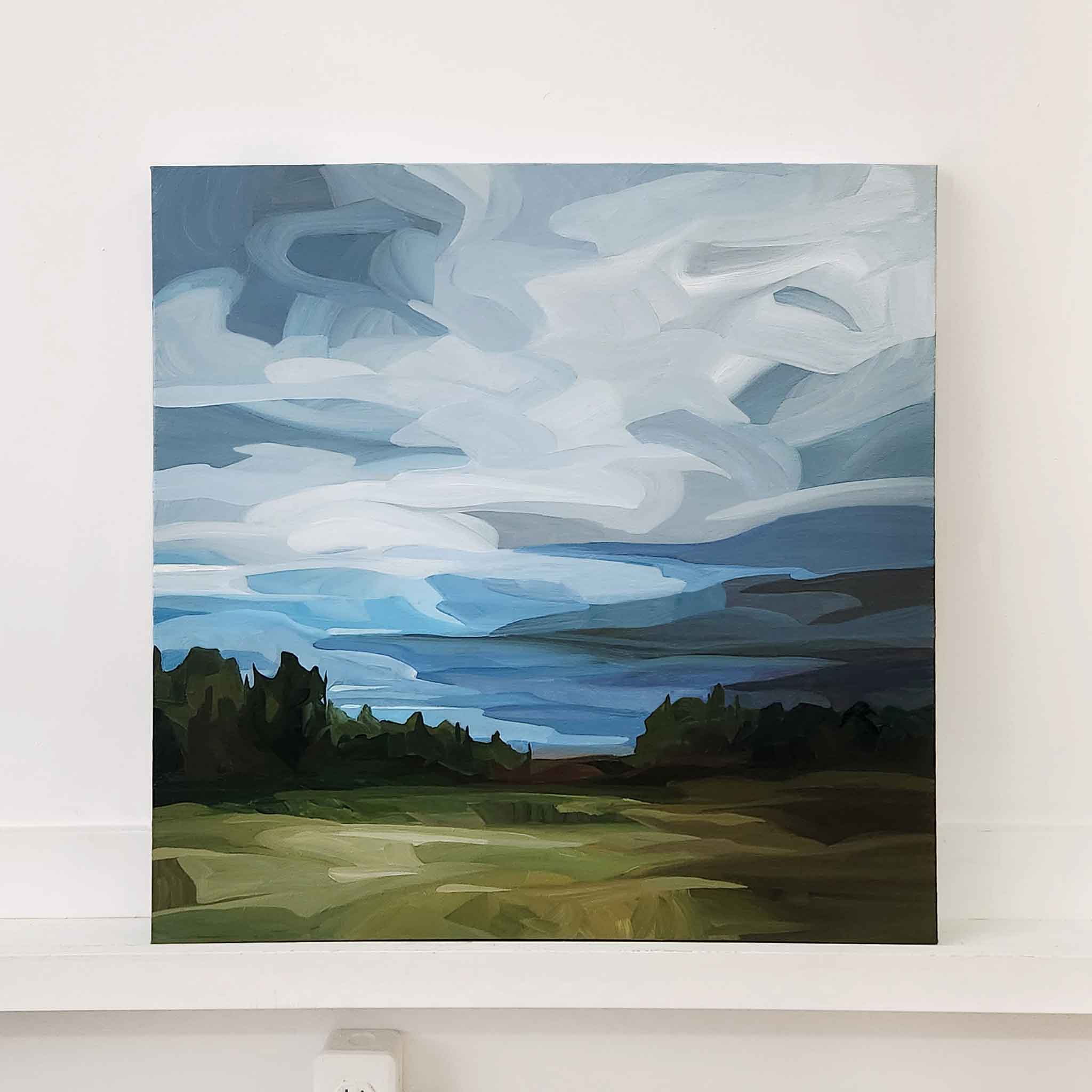 contemporary abstract landscape painting with a blue sky 24x24