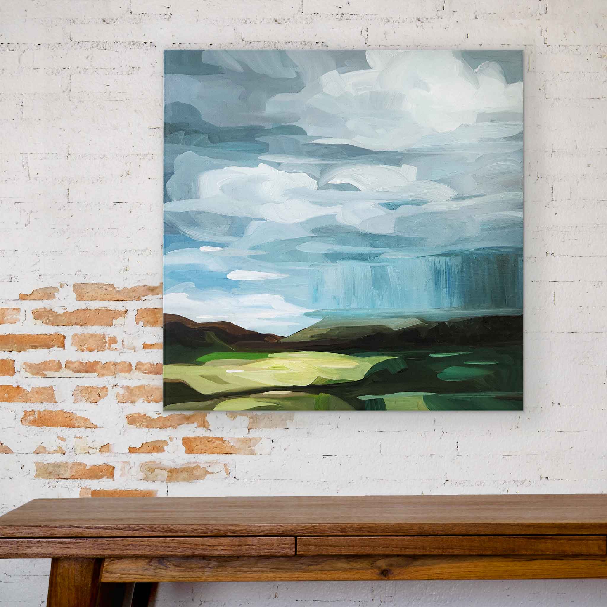 abstract landscape painting on canvas 24x24 hanging over table