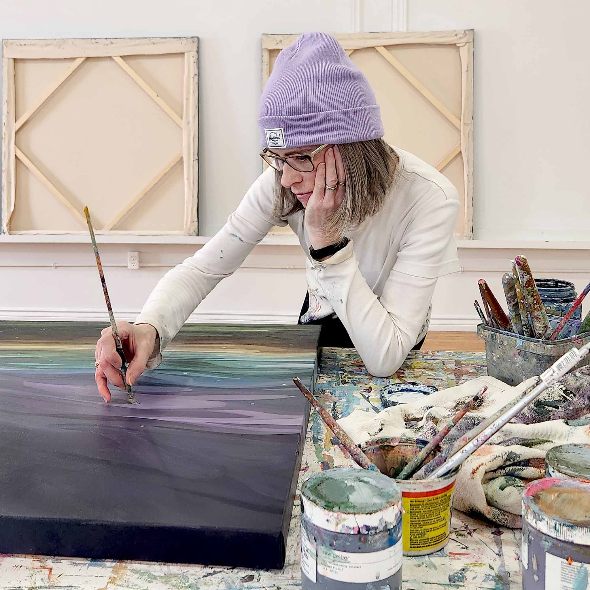 canadian artist Susannah Bleasby painting in her hamilton ontario studio
