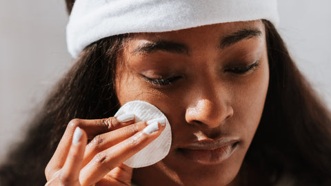 woman cleansing skin for ice facial