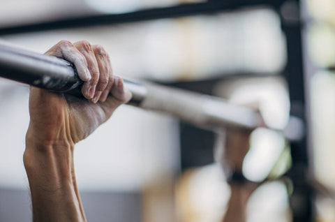 Hands on pull-up bar