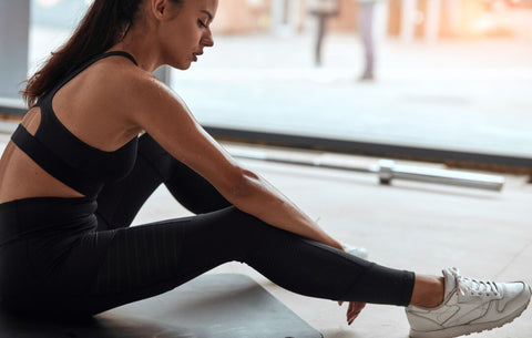 Woman looking tired on mat