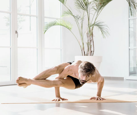 man doing yoga