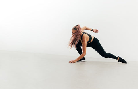 Woman in intense workout pose