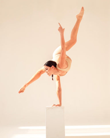 Urnaa contortion pose in a box