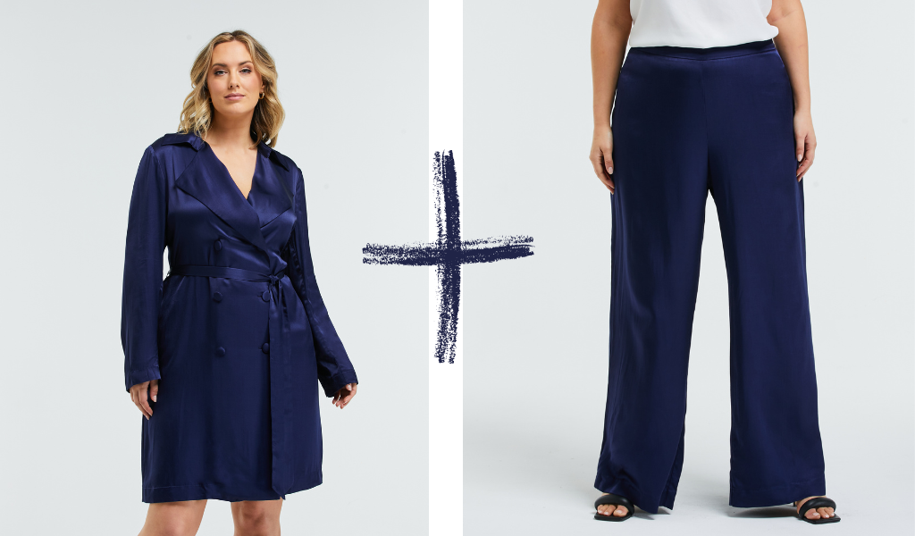 Pictured: Womens Curve Models Jessica King wears the Samantha Satin Trench and the Samantha Satin Pant. Both garments are a deep french navy blue