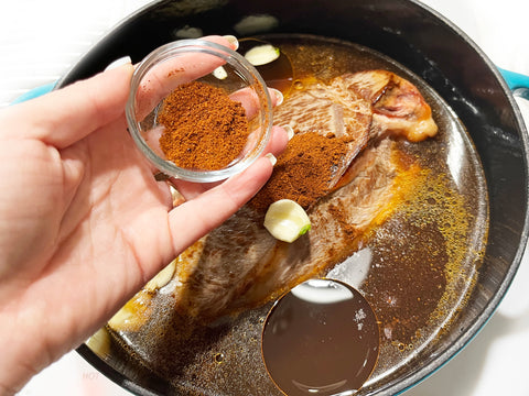 add spices to roast in 5 quart cast iron dutch oven