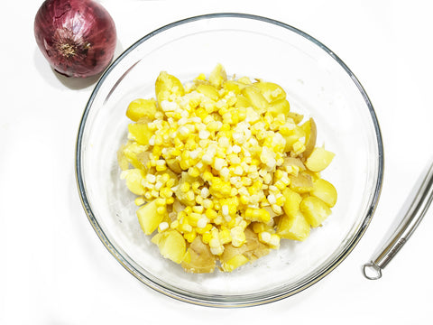 corn and potatoes in bowl for salad