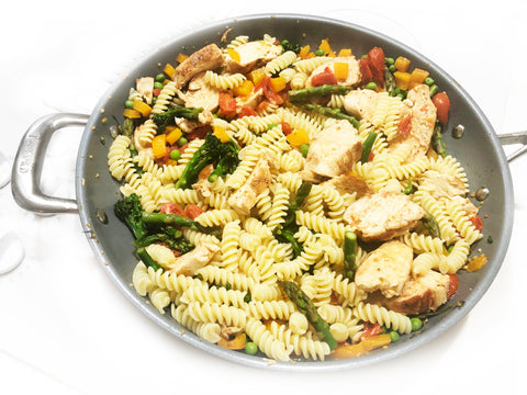 adding chicken and pasta to pasta primavera in 12 1/2 inch induction 21 ceramic coated fry pan