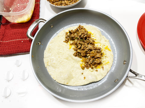 add cheese and meat for quesadilla in 12 inch coated id21 non-stick fry pan