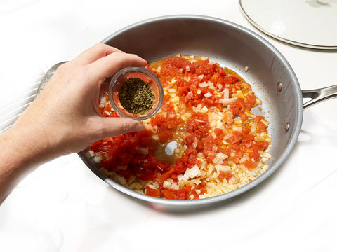 making sauce for eggplant lasagna in saute skillet