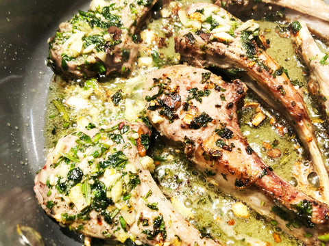lamb chops cooking in herb butter sauce, 3.clad saute skillet