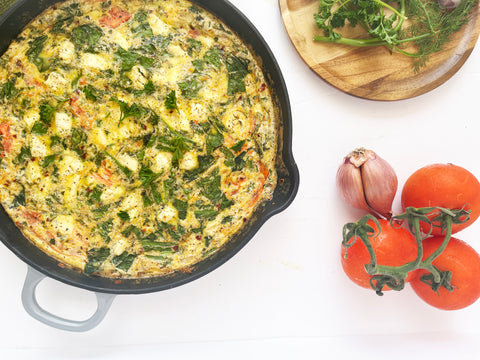 summer frittata in grey cast iron skillet