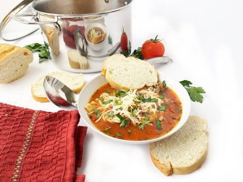 lasagna soup in bowl with bread