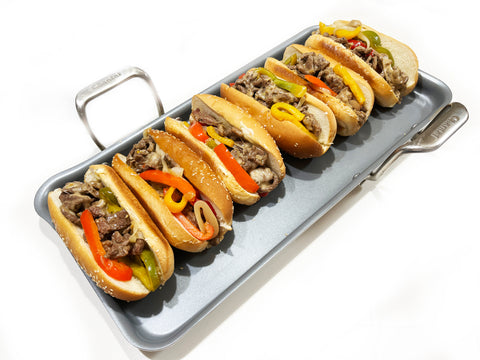 fill bread with cheesesteak on griddle for oven