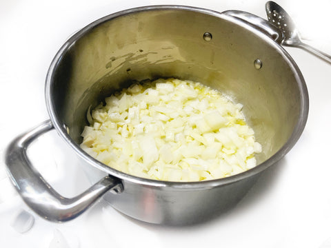 cooking onions in stock pot