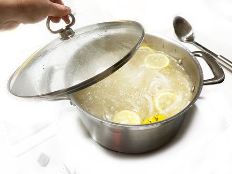 place glass lid on stockpot while poaching chicken