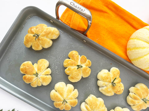 rosemary stems onto pumpkins on nonstick coated stainless steel griddle