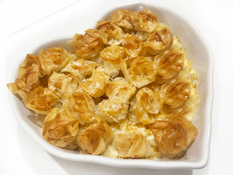 phyllo rose topped mac n cheese in ceramic heart baker