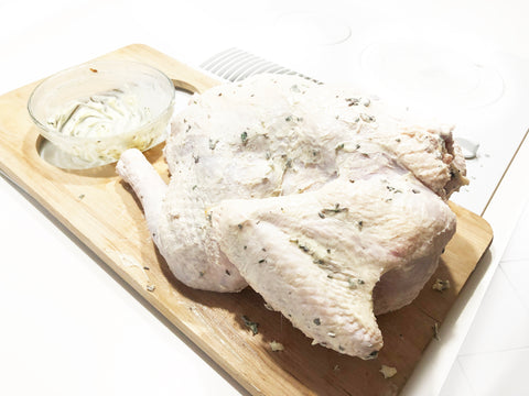 rub butter on cirtus herb turkey made in stainless steel roaster with rack