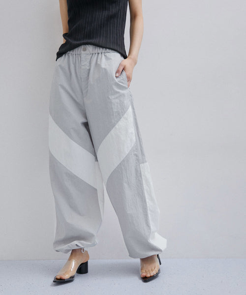 ADAM ET ROPE’BOTANICAL DYED  NYLON PANTS