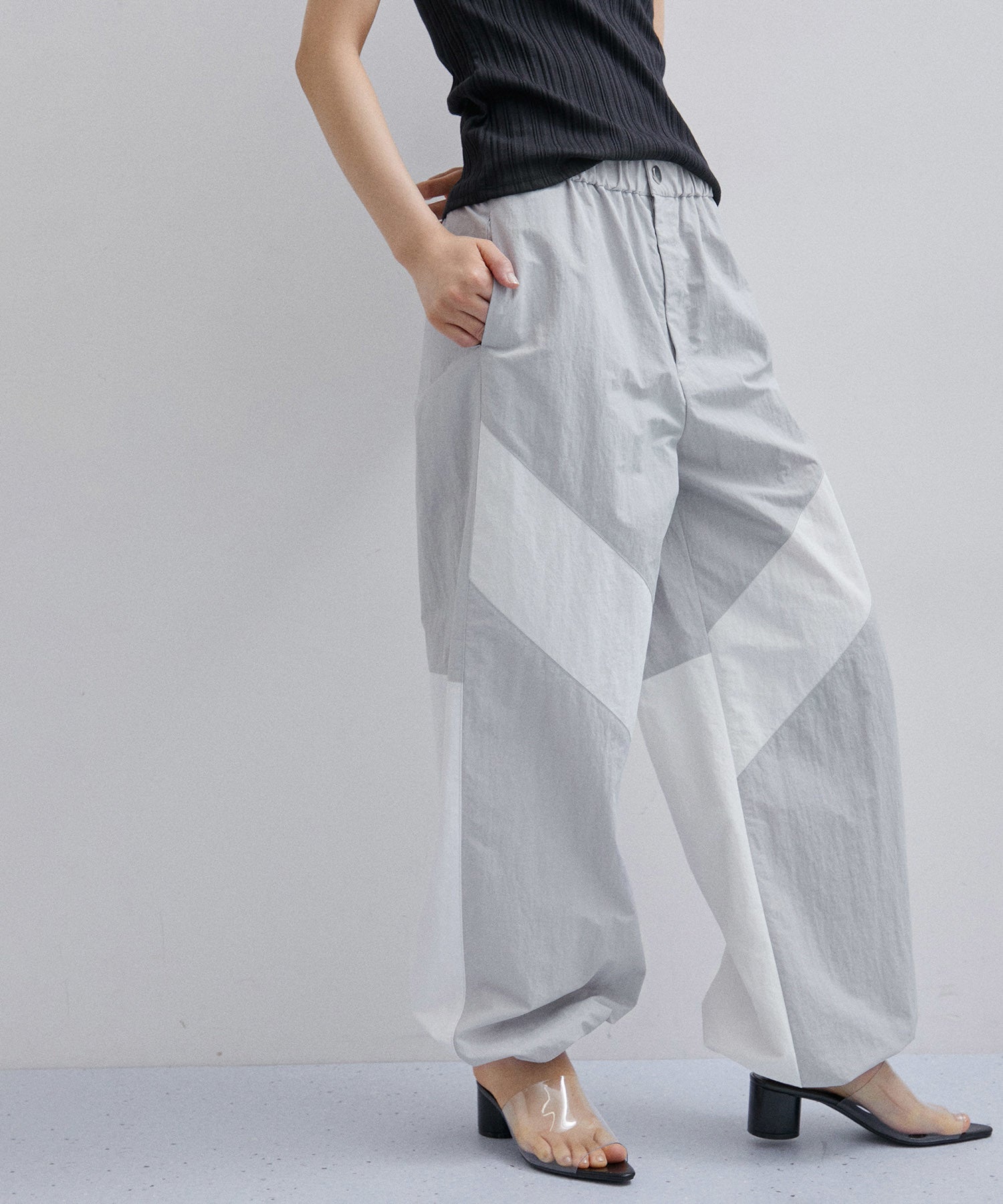 ADAM ET ROPE’BOTANICAL DYED  NYLON PANTS