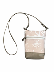 image on a white background shows a tan crossbody bag with plant and snake motifs