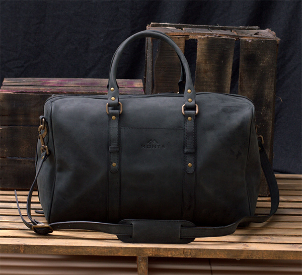 Discover MARS- handmade leather duffle bag with metal zip and belt