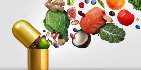 Gold color supplements capsule opening to reveal explosion of vegetables and nourishing foods
