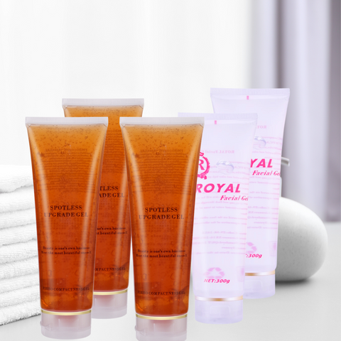 Three Tubes of Body Slimming Conductive Gel and Two Tubes of Facial Conductive Gel, Towels stacked