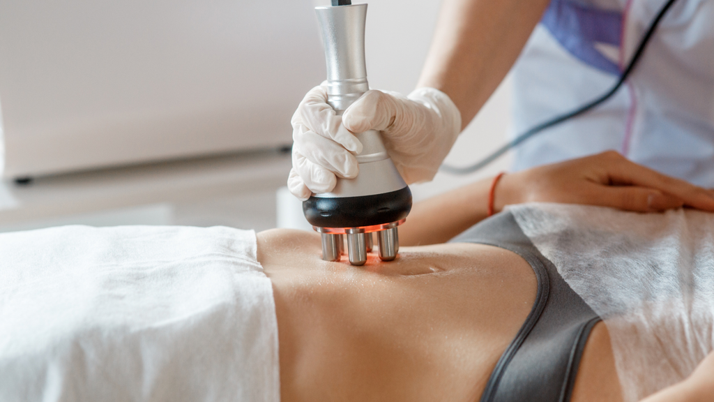 Radio Frequency probe is applied to woman’s stomach