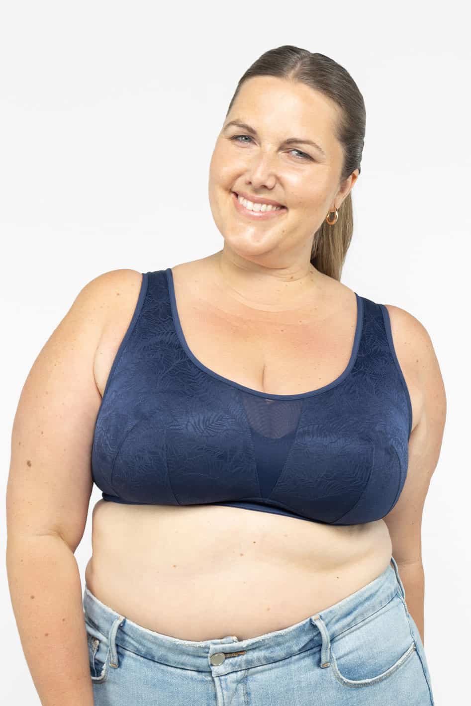 Understance Amber Smooth Lace Wireless Soft Cup Pullover Bra @Charlotte wears Navy Blue in 42DD - #color_navy-blue